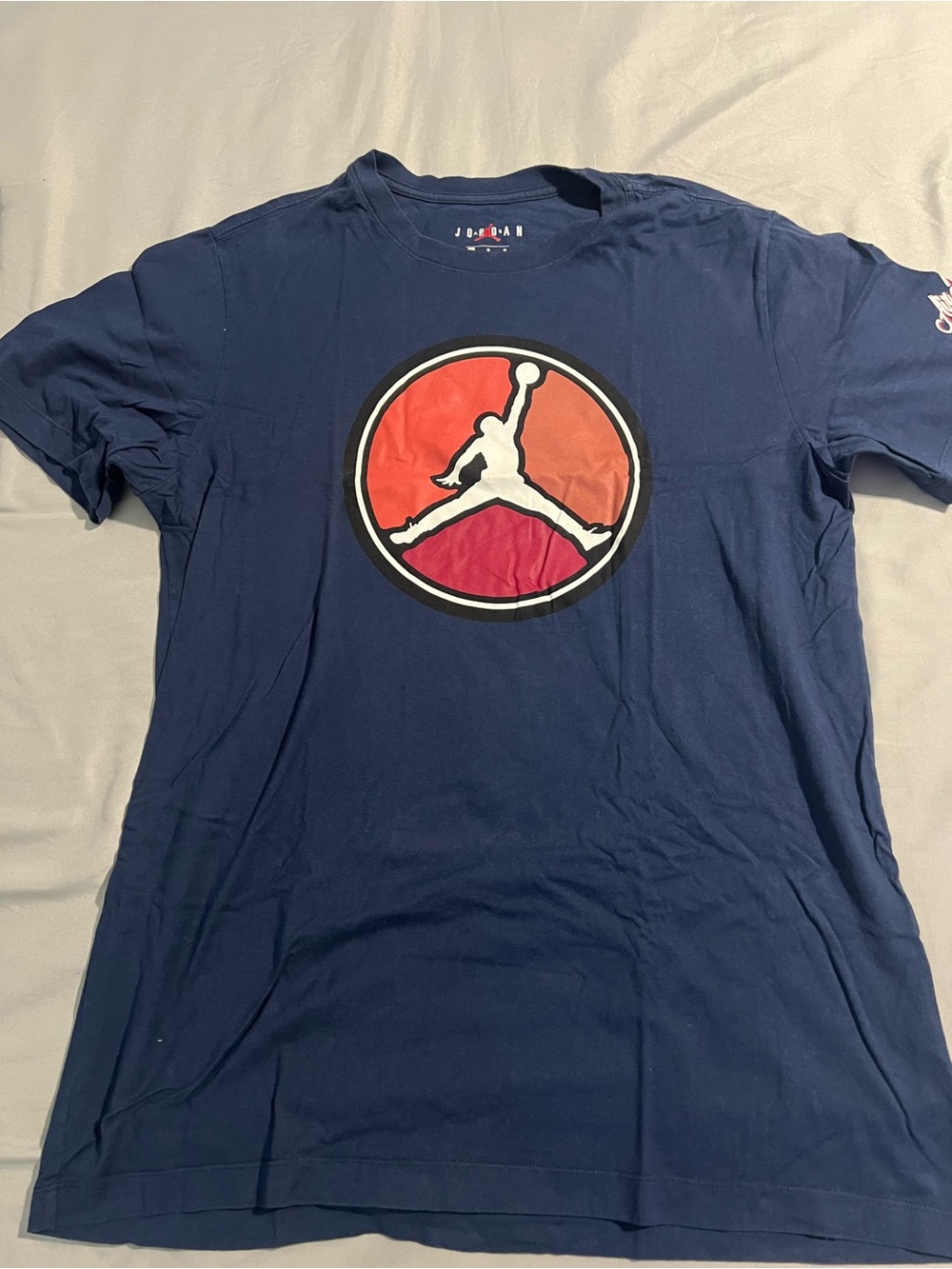 Jordan Navy Short-Sleeve Tee with Red-Orange Jumpman Circle Size L